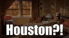 a man laying on a bed with the word houston written on the bottom