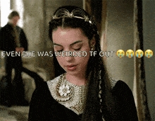 a woman in a black dress with a tiara on her head with the words even she was weirded tf out