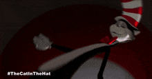 a cartoon cat in a hat with the hashtag #thecatinthehat