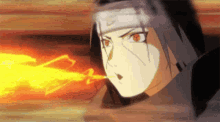 a close up of a person 's face with a fire coming out of their mouth .