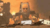 a robot with a picture of joe biden on it is surrounded by guns and a sign that says spiderrund