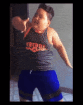 a young boy wearing a shirt that says ' chiefs ' on it