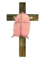 a cross with a pink pig on it