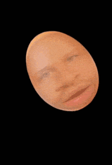 a blurry picture of a man 's face with his eyes closed