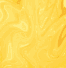 a close up of a yellow liquid with waves