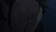 a close up of a person 's face with a tear running down their face