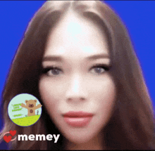 a woman 's face with a teddy bear and the word memey on the bottom right