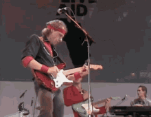 Dire Straits Live Aid GIF - Dire Straits Live Aid Mark Knopfler GIFs