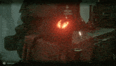 a screenshot of a video game shows a cat with a red light coming out of its eyes