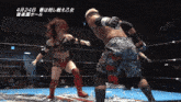 a female wrestler is fighting a man in a wrestling ring with chinese writing on the bottom