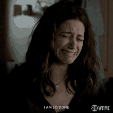a woman is crying in a showtime commercial