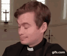 blinking guy blinking priest holy