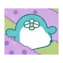 a penguin with a bandage on its face is laying on a purple and green blanket .