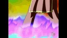 a woman in a pink skirt is standing in a rainbow of colors ..