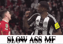 a soccer player wearing a black and white jersey with the word kisel on it