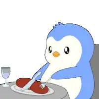 a penguin is sitting at a table with a plate of food