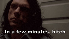 in a few minutes bitch is written next to a man with long hair