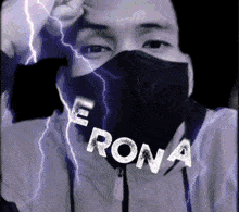 a man wearing a black mask with the word rona written on it