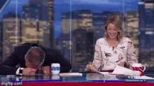hysterical laughing hysterically laughing newscasters so funny