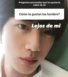 a close up of a person 's face with the words lejos de mi written above it