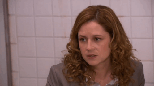 Pam from the office looks at the camera