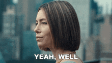 a woman says " yeah well " in front of a building