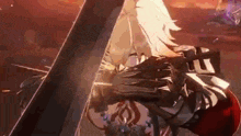 a close up of a person holding a sword in their hand .