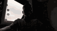 a blurred image of a person wearing a white shirt that says nike on the front