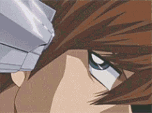 a close up of a cartoon character 's face with a gun in his hand