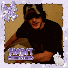 a picture of a man with the words habit de angel written on it