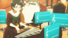 a girl playing a xylophone in front of a drum that says yamaha