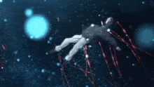 a person is floating in the air with a blue light behind him