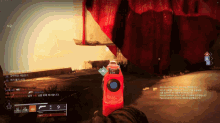 a screenshot of a video game shows a person holding a red bottle