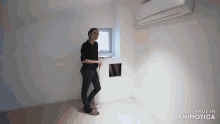 a woman is standing in a room with the words made in animotica on the bottom