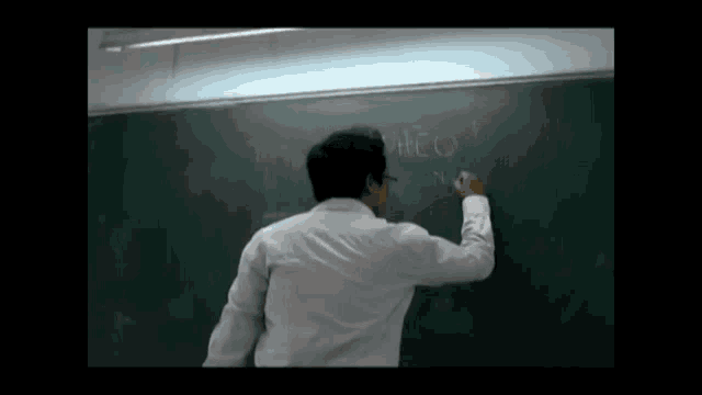 a man is writing on a blackboard that says " heo "
