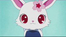 a cartoon rabbit with a pink flower on its head and the word tokyo on the bottom