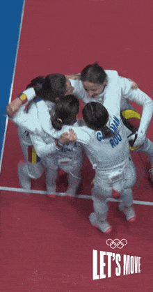 Group Hug Fencing Olympics GIF - Group Hug Fencing Olympics Team Win GIFs