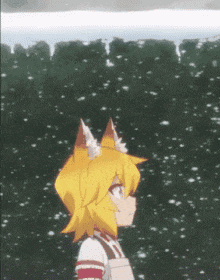 a girl with fox ears stands in front of a snowy fence