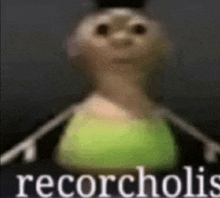 a blurred image of a cartoon character with a green shirt and the words recorcholis .