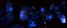 a skeleton and a demon are standing in a dark room