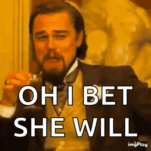 a man in a suit is holding a glass of whiskey and saying oh i bet she will