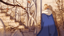 a man in a blue cape stands in front of a brick wall