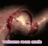 a poster that says welcome room annie with a pair of headphones in the background