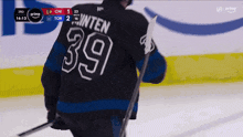 a hockey player with the number 39 on their jersey