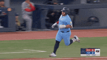 a baseball player is running on the field with a scoreboard in the background that says sn