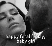 a black and white photo of a man kissing a woman with the words happy feral friday baby girl