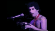 Freddie Mercury Drink Water GIF - Freddie Mercury Drink Water Concert GIFs