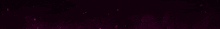 a close up of a pink light coming out of a purple background .