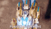 a robot with the words `` places everyone '' written on it .