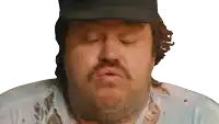 a man with a beard wearing a black hat and a blue shirt